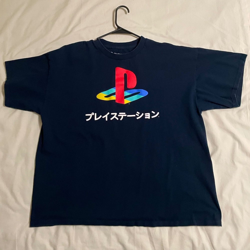 2XL Playstation T-shirt with Japanese figures. Blue. 100% cotton.